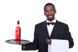 Waiter holding a tray