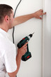 Man using a cordless power drill