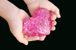 heart in children's hands(black background)