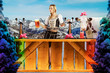 tiroler girl in the snow behind a bar