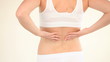 Video: Fit woman massaging her back Fit woman massaging her back