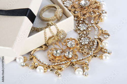 Photo: Casket with Jewelry on a white background Casket with Jewelry on a white background