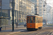 Old vintage orange tram on the street of Milan, Italy Old vintage orange tram on the street of Milan, Italy