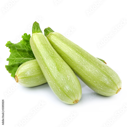Photo: Fresh vegetable marrow decorated with green leaf lettuce Fresh vegetable marrow decorated with green leaf lettuce