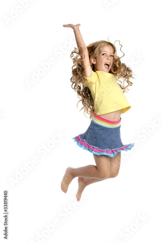 Photo: little beautiful girl fly jumping isolated on white little beautiful girl fly jumping isolated on white