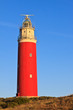Seaside with sand dunes and lighthouse Seaside with sand dunes and lighthouse