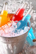 Bottles of cooler drinks with ice