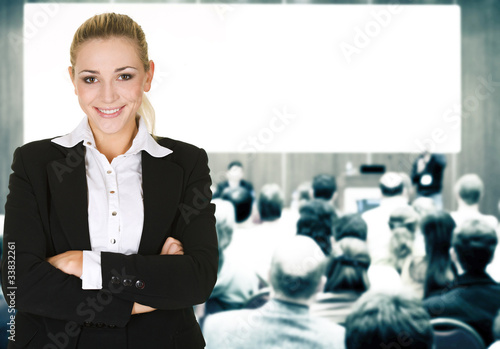 Photo: woman over conference hall woman over conference hall