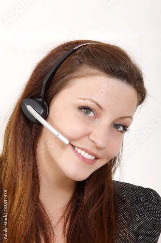 Photo: young beuatiful woman with headset young beuatiful woman with headset