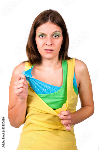 Photo: Attractive woman can not decide between different outfits Attractive woman can not decide between different outfits