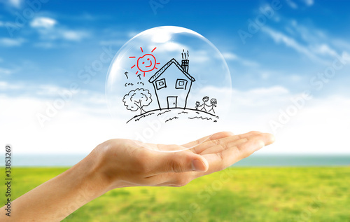 Photo: Real-Estate Bubble on the background sky. Real-Estate Bubble on the background sky.