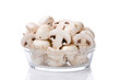 Bunch of sliced mushrooms in a glass bowl