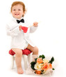 Bimbo elegante con fiori e lecca lecca