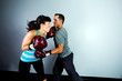 Man punching woman