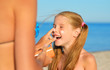 Mother and daughter on the beach
