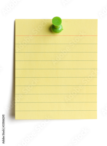 Photo: Yellow note pad pinned on white background Yellow note pad pinned on white background