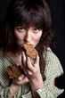 beggar woman eating bread