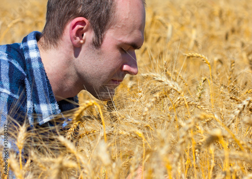 Photo: Farmer in wheat field Farmer in wheat field