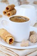 small white cup of strong espresso coffee