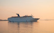 cruise yacht on the background of sunset on the islands