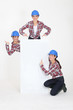 triplet girls wearing safety hat
