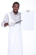 Chef with a white cutting board and sharp knife