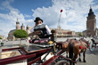 Cabby man on the Old Town square in Krakow, Poland Cabby man on the Old Town square in Krakow, Poland