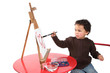 Little boy painting a picture