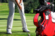 Man playing golf with golf bag Man playing golf with golf bag