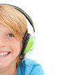 half face of smiling happy boy listening to music