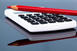 Rotstift und Taschenrechner