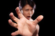 Foto: Asian woman trying to reach Asian woman trying to reach