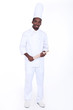Happy male chef holding rolling pin