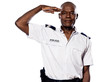 Portrait of a policeman saluting