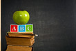 ABC and green apple on old textbook ABC and green apple on old textbook