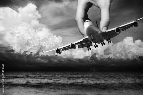 Photo: Hand of fate. Flight safety conceptual theme. Hand of fate. Flight safety conceptual theme.