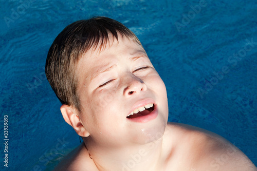 Photo: Sunny little boy swiming Sunny little boy swiming