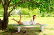 Young woman relax bench tree park pigeon