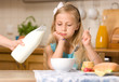girl eating breakfast