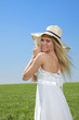 Photo: Young woman enjoying sunshine Young woman enjoying sunshine