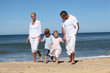 Beautiful family at the seaside in summertime