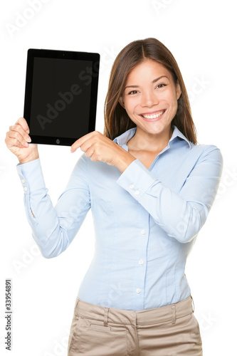 Photo: Woman showing tablet computer Woman showing tablet computer