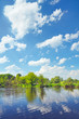 Cloudy landscape with flood waters of Narew river, Poland.