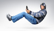 Foto: Funny driver with wheel in a jacket with a hood, concept Funny driver with wheel in a jacket with a hood, concept