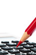 Rotstift und Taschenrechner