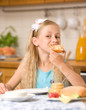 girl eating breakfast