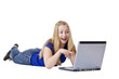 Foto: Junges hübsches Mädchen zeugt freudig auf Computer Monitor. Junges hübsches Mädchen zeugt freudig auf Computer Monitor.