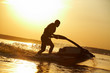 man jumps on the jetski