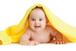 Adorable happy baby in colorful towel