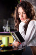 Young beautiful girl enjoying  in cafe bar